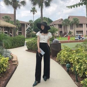 Eugenia Kim style black straw hat for vacation